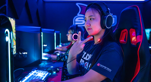 International Student Playing Games in the ESports Room